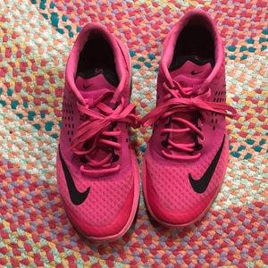 Pink Nike tennis shoes